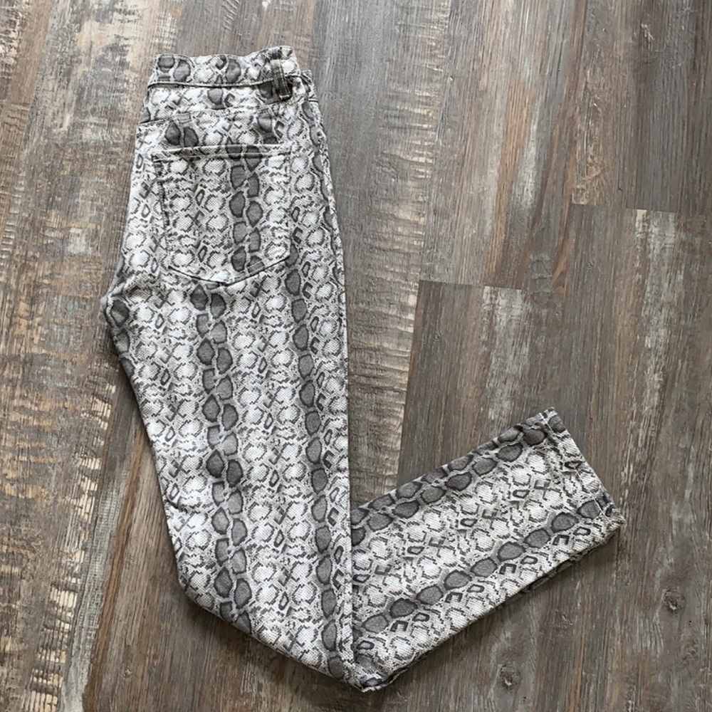LILI SIDONIO snake print skinny jeans.